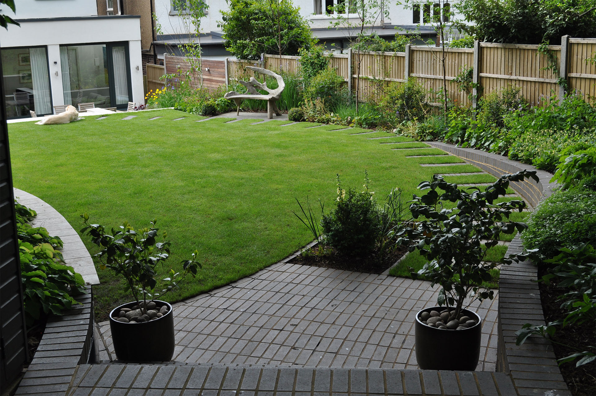 Ketley bricks in a garden by designer Jilayne Rikards Image by Simon Bourne